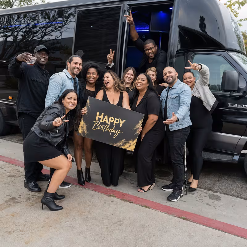 Party bus interior with wraparound leather seating and LED lighting in McKinney