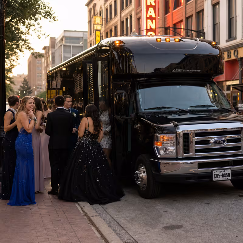 Passengers loading luggage while boarding an McKinney group shuttle