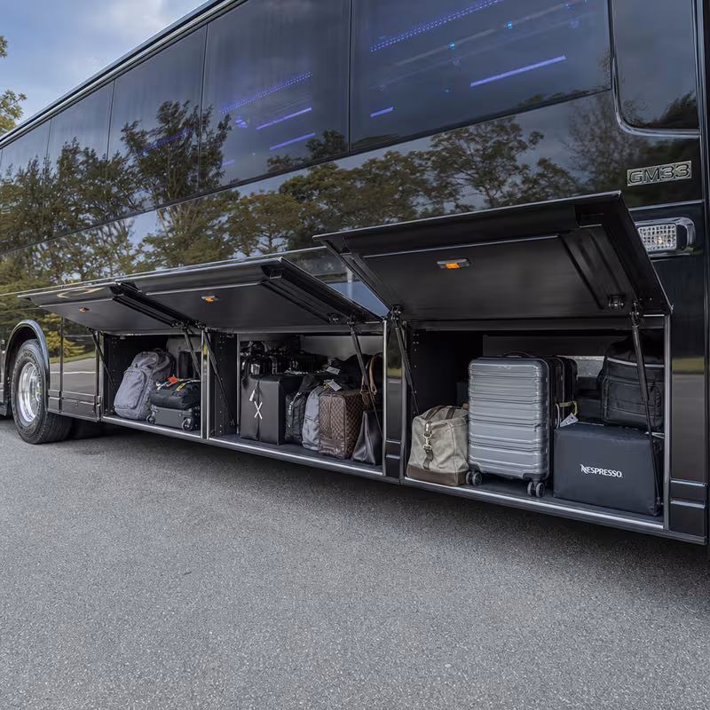 Party bus interior with wraparound leather seating and LED lighting in McKinney
