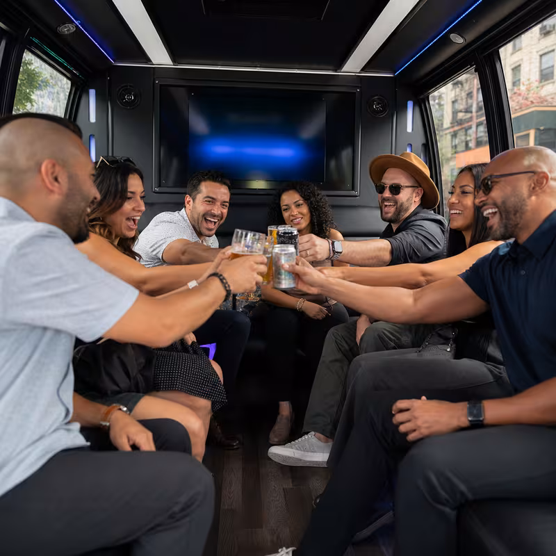Group boarding a white charter bus for Winery & Brewery Tour Transportation transportation in McKinney